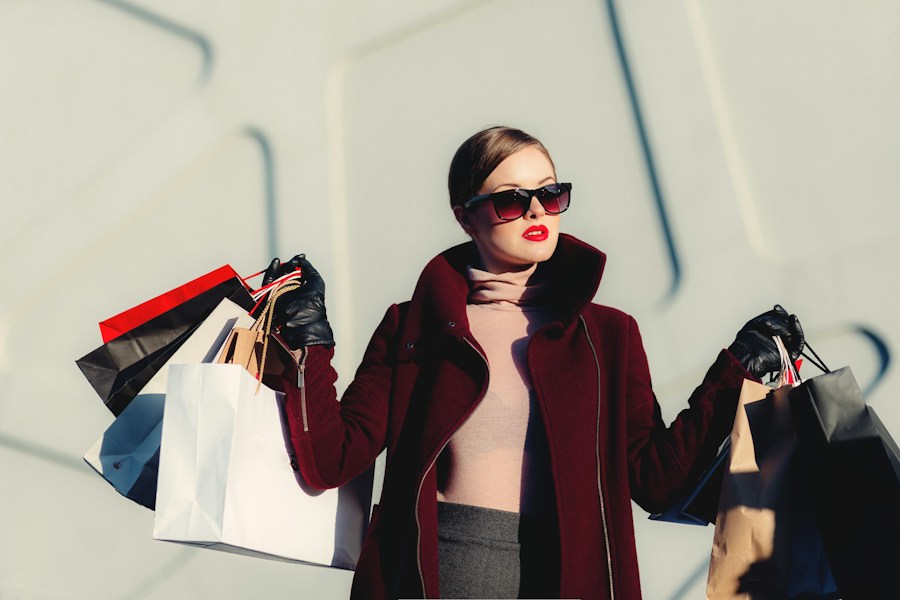 Fashion inspiration with clothing and shopping bags